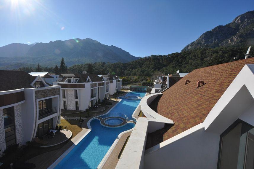 ბინები გარეუბანში, ზღვასთან თურქეთში, ქემერში — უძრავი ქონების ყიდვა და მფლო ბელებისგან GEOLN.COM. ფოტო 1