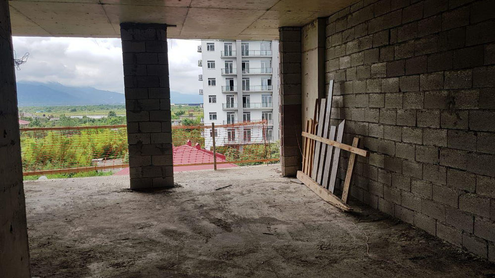 Black frame in a new building — Find off-plan property or real estate resale directly from developers and owners GEOLN.COM. Photo 1