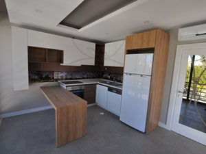 ბინები გარეუბანში, ზღვასთან თურქეთში, ქემერში — უძრავი ქონების ყიდვა და მფლო ბელებისგან GEOLN.COM. ფოტო 6